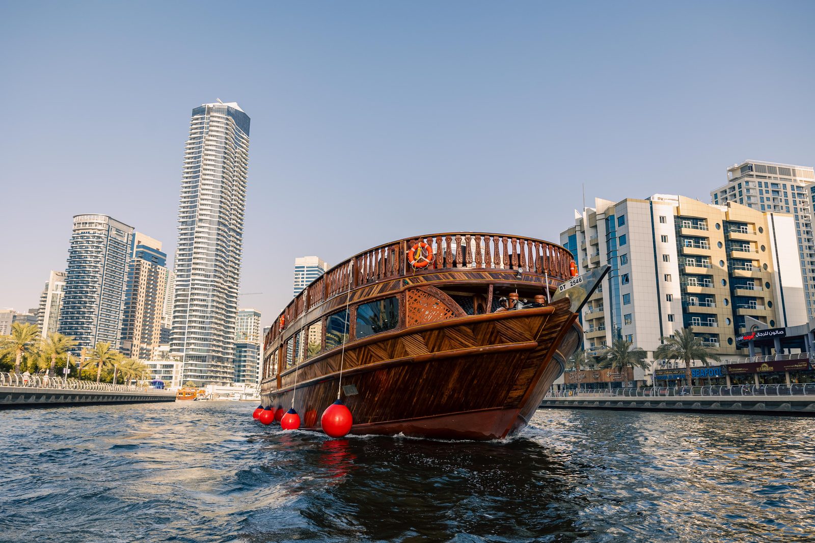 Sunset Dhow Cruise vs. Night Dinner Cruise: Which Experience is Better? - Dubai Travel Guide